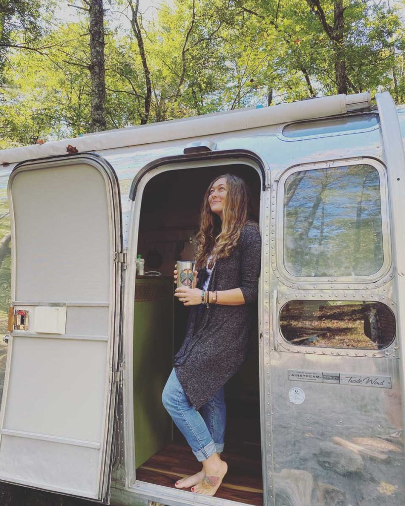 Woman with vintage Airstream