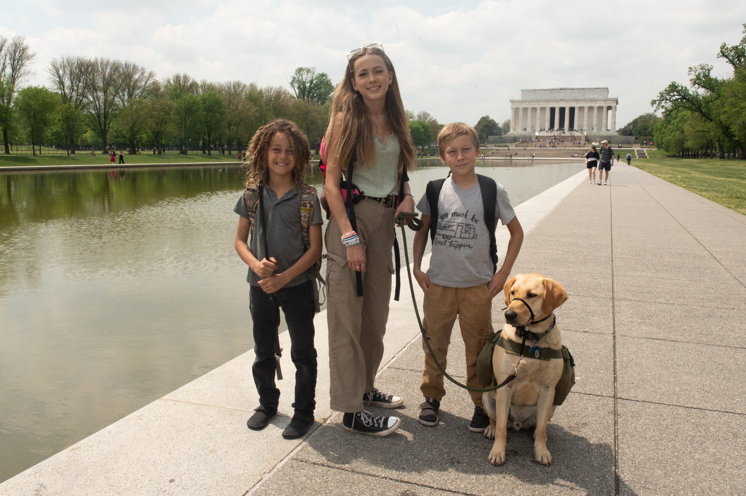 kids and dog at reflective pool, Lincoln memorial, Washington DC